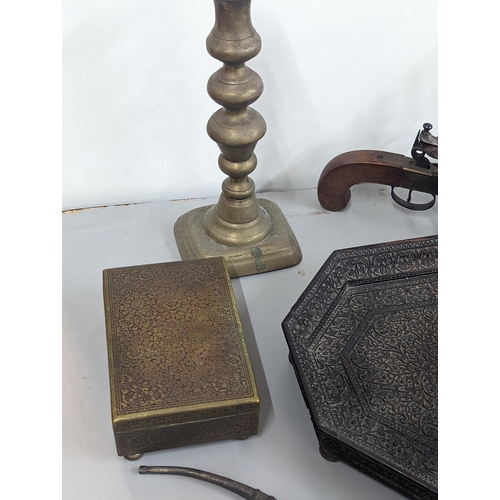 311 - A mixed lot to include a carved South Asian tray, opium pipe, brass boxed to include one with emboss... 