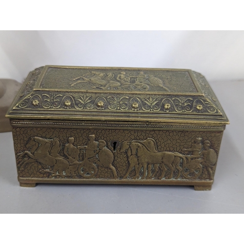 311 - A mixed lot to include a carved South Asian tray, opium pipe, brass boxed to include one with emboss... 