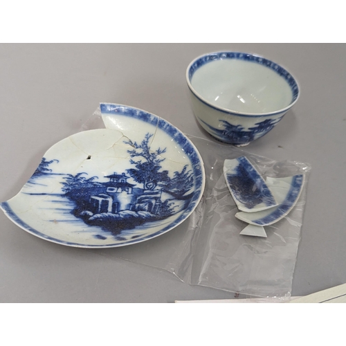 36 - Nanking Cargo - a blue and white pagoda tea bowl and saucer A/F, with certificate of authenticity
Lo... 