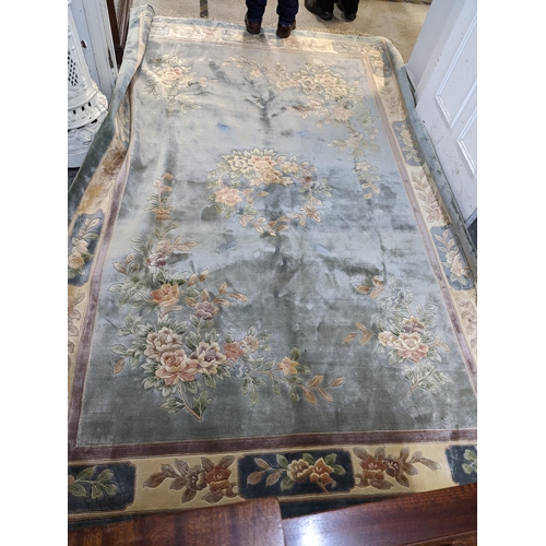 41 - A Chinese handwoven silk blue ground rug 183cm x 274cm Location: A3F