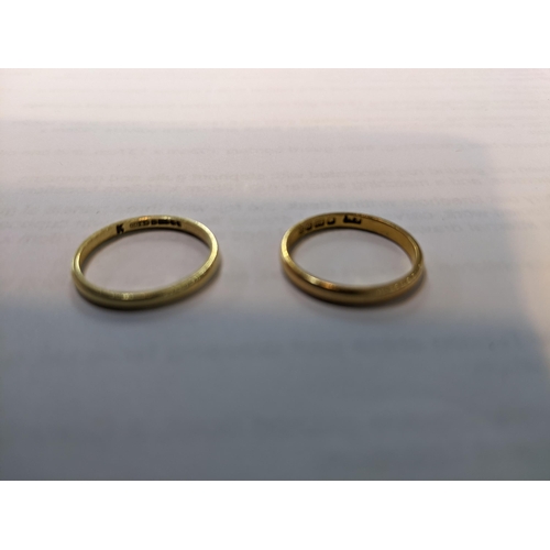 55 - A 22ct gold band, 2.15g and an 18ct gold band, 1.55g
Location: CAB5