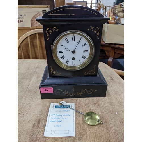 59 - A Victorian 30 day mantel clock with white enamel Roman dial, moon hands, the movement stamped for S... 