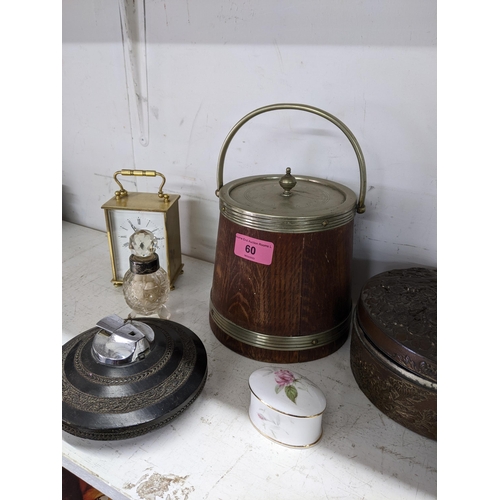 60 - A mixed lot to include a Victorian oak and silver plated biscuit barrel, cut glass smelling salts bo... 