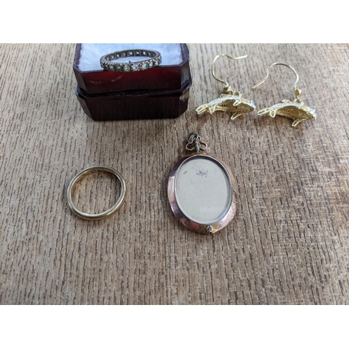 63 - A 9ct gold band, 2.6g, 9ct gold full eternity ring set with approx 24 white stones (possibly white s... 