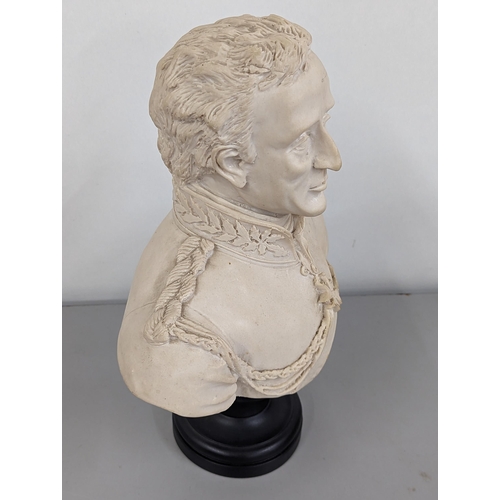 84 - A composition ware bust of Lord Wellington in uniform, on turned black base, Fama Medallion to under... 