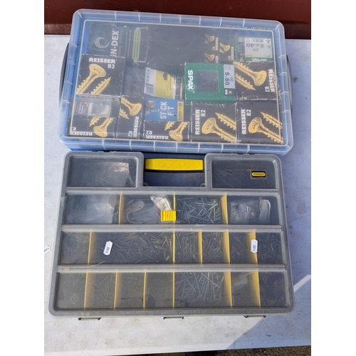 186 - A Stanley tool organiser containing mixed screws together with a box of boxed screws
Location: CON