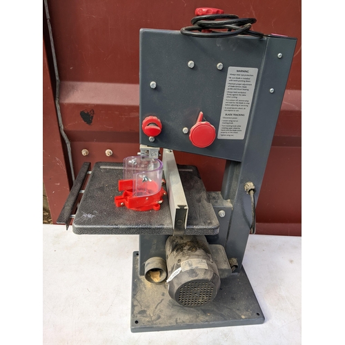 189 - A Red-eye 250w 200mm Band saw with laser
Location: CON