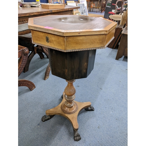 2 - A 19th century mahogany sewing table having an octagonal hinged top and on lion paw feet, 77cm h x 4... 