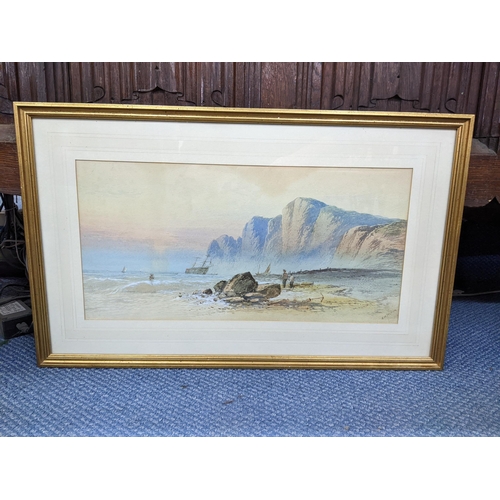 24 - William Henry Vernon - A watercolour depicting a beach scene with boats and figures to the foregroun... 