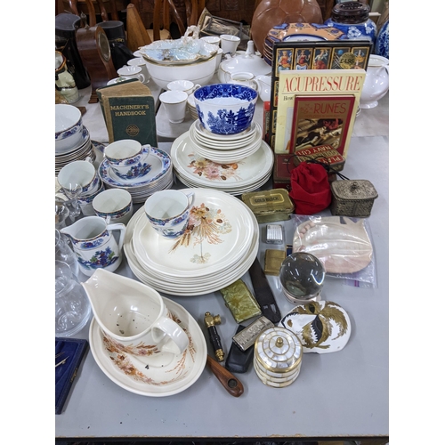 30 - A mixed lot to include Poole Summer Glory, vintage tins, Palissy tea service, books, lighters, and o... 