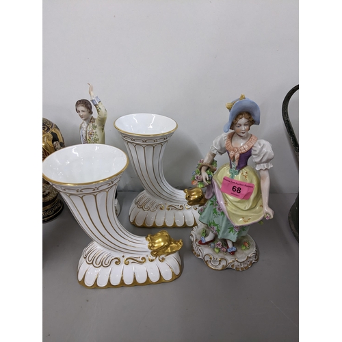 68 - Four porcelain figures to include two 19th century Sitzendorf figures, together with a Bohemian pain... 