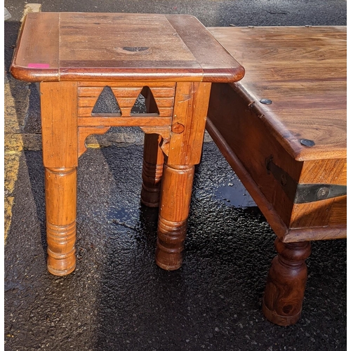 76 - A vintage teak rectangular topped coffee table with two drawers and wrought iron supports, 46cm h x ... 