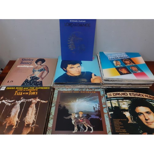 132 - A quantity of LPs mainly 1970s to include Neil Diamond, Dolly Parton, Elton John, Cliff Richard, Cla... 