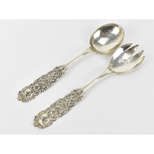 433 - A pair of Norwegian dragestil silver salad servers by Magnus Aase, circa 1930s, with hammered bowls,... 