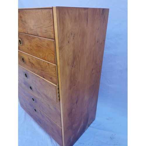 439 - A mid century yew veneer chest of drawers by Archie Shine and Robert Heritage for Heals of London, w... 