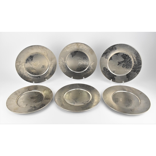 443 - A set of six Molin for Thomas Goode porcelain underplates, designed with silvered floral pattern, th... 