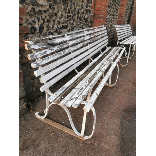 453 - A painted wood and wrought iron slatted garden bench, 87 cm high x 243 cm wide
Location: CON