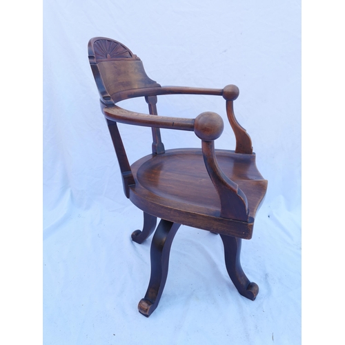 422 - A Victorian mahogany swivel desk chair, with curved cresting rail terminating in ball hand rests, wi... 