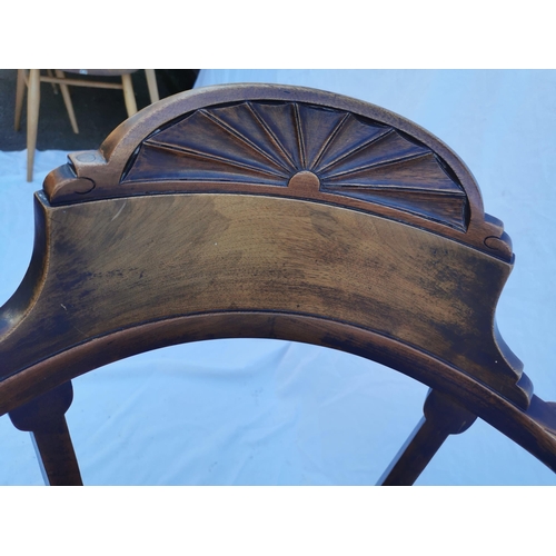 422 - A Victorian mahogany swivel desk chair, with curved cresting rail terminating in ball hand rests, wi... 