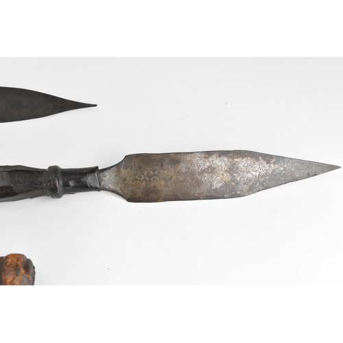 425 - African tribal weapons comprising hide bound hunting spear and smaller example, sword with similar h... 