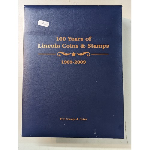 32 - A Danbury mint '100 Years of Lincoln coins and stamps 1909-2009' by PCS stamps and coins, a folder c... 