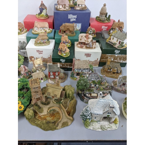 344 - A collection of approximately 20 Lilliput Lane cottages, 13 boxed to include Kirkbrae cottage, dream... 