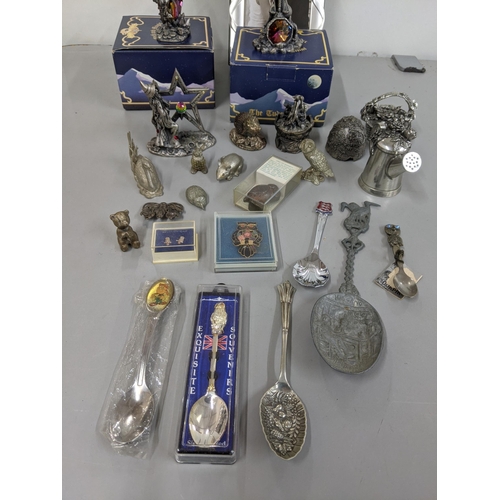 345 - A mixed lot to include two boxed Pewter ornaments to include the Unicorn of Justice, Dragon of Ice x... 