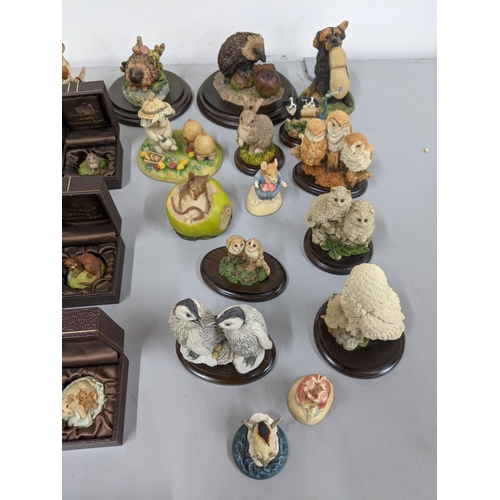 347 - A collection of Country Artists ornaments to include boxed examples including panda, frog, lamb, tig... 