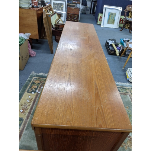 377 - A Nathan teak sideboard with twin doors, a all front and three drawers, 75cm x 120cm
Location: A3F