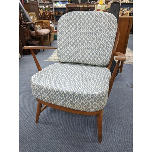 458 - A mid 20th century Ercol model 203 beech spindle back armchair
Location: A3B