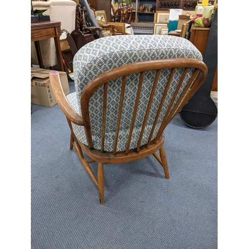 458 - A mid 20th century Ercol model 203 beech spindle back armchair
Location: A3B