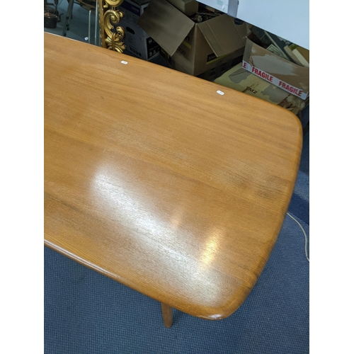 459 - A mid 20th century Ercol elm and beech plank dining table, 71cm x 153cm
Location: LWF