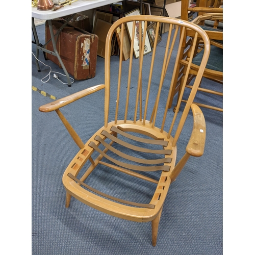 461 - A mid 20th century Ercol beech spindle back lounge armchair
Location: LWM