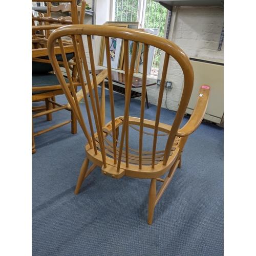 461 - A mid 20th century Ercol beech spindle back lounge armchair
Location: LWM