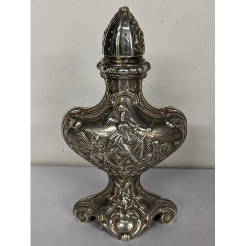 457 - A late 19th/early 20th century import Hanau silver sugar caster of classical form and embossed decor... 