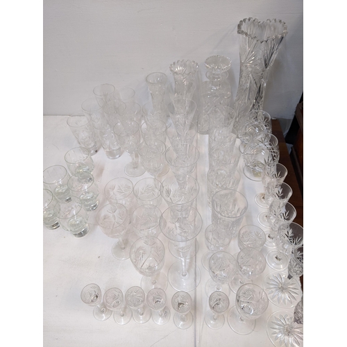 147 - Glass to include sets and part sets to include six champagne, wine glasses, decanter, candlesticks, ... 