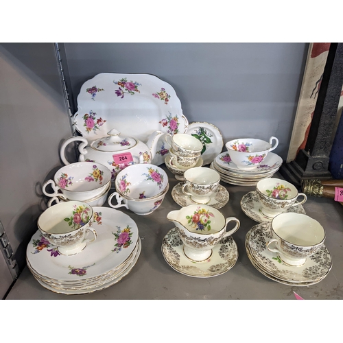 204 - An Aynsley vintage six-setting part tea set with roses and other floral decoration, together with a ... 