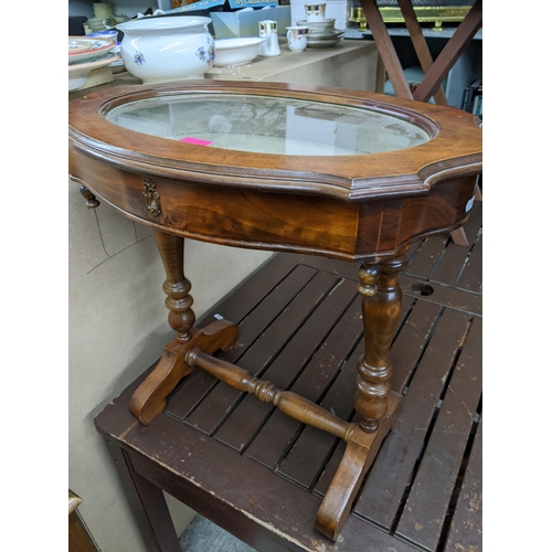 383 - A late Victorian walnut music cabinet, the carved and shaped extended back over a top with moulded e... 