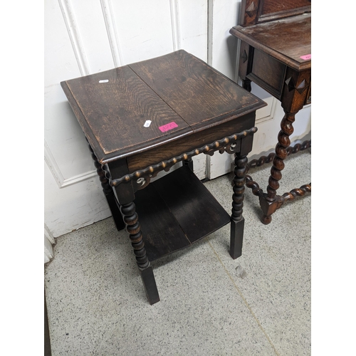 427 - THIS LOT HAS BEEN WITH DRAWN

Two 1930's oak tables, one with barley twist legs, 81cm h x 60cm w, an... 