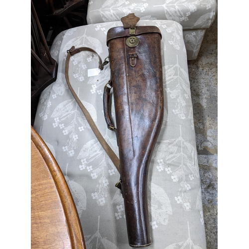 466 - A late 19th/early 20th century leather leg of mutton gun case, baize lined interior, brass secure le... 