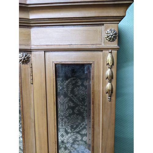 471 - An Edwardian satin walnut bow fronted display cabinet with inlaid stringing, applied gilt paterae an... 