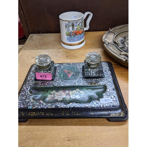 472 - A Victorian papiermache desk inkwell floral decorated with flowers and a butterfly, scattered inlaid... 