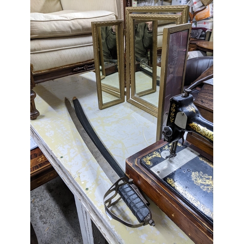 479 - A lot to include a wooden cased Singer sewing machine model 15k serial number F91644 c1910, a gilt f... 