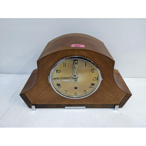 495 - An Art Deco walnut cased Westminster chime clock Location: A3B