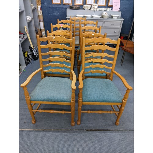 462 - A set of reproduction oak ladder back dining chairs having turned supports and pad feet
Location: LA... 