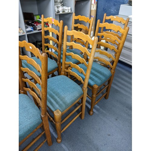 462 - A set of reproduction oak ladder back dining chairs having turned supports and pad feet
Location: LA... 