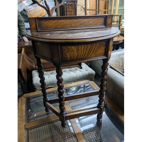 432 - A 1930's demi lune oak hall table with barley twist legs, 81cm h x 70cm w
Location: G