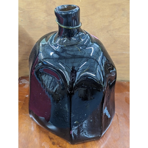 490 - A modern glass bottle of octagonal form inscribed Velt 91 to the base, 30cm h
Location: A3M