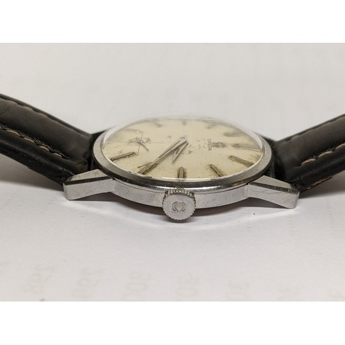 76 - An Omega, manual winding gents stainless steel wristwatch, having a textured dial with subsidiary se... 