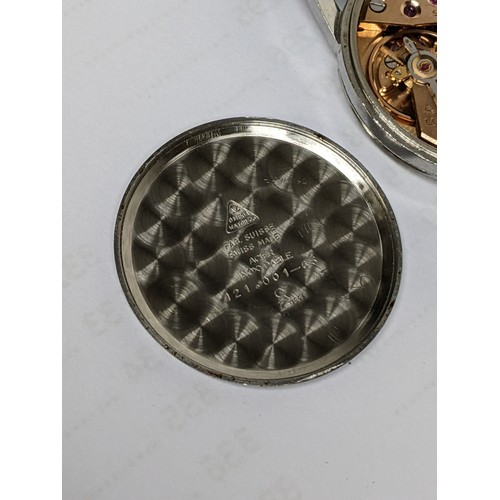 76 - An Omega, manual winding gents stainless steel wristwatch, having a textured dial with subsidiary se... 